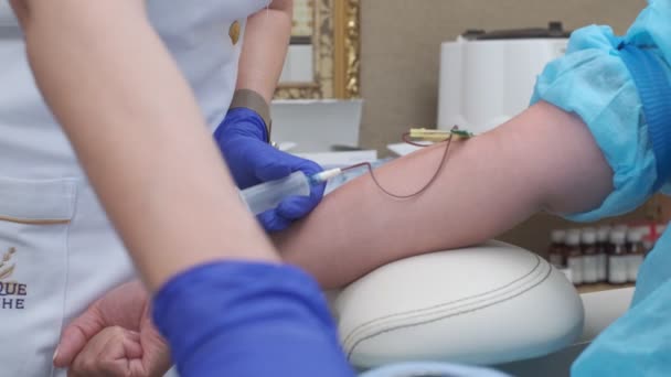 Blood Sample Taken Vein Nurse Wearing Blue Gloves — Vídeo de stock