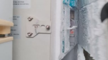 Lab samples are taken from the fridge, slow motion