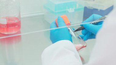 Work on samples of substances is carried out in the laboratory, slow motion