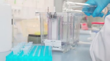 Work on samples of substances is carried out in the laboratory, slow motion