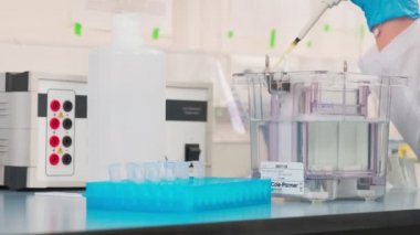 Work on samples of substances is carried out in the laboratory, slow motion