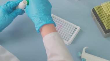 Work on samples of substances is carried out in the laboratory, slow motion