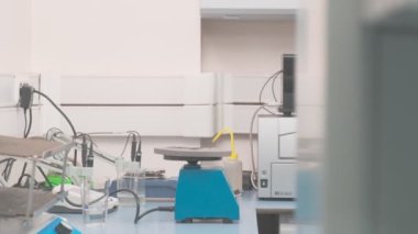 Work on samples of substances is carried out in the laboratory, slow motion
