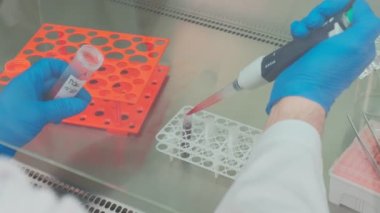 Work on samples of substances is carried out in the laboratory, slow motion