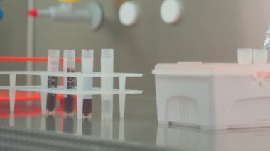 Work on samples of substances is carried out in the laboratory, slow motion