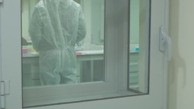 Work on samples of substances is carried out in the laboratory, slow motion