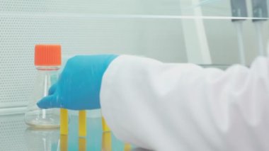 Work on samples of substances is carried out in the laboratory, slow motion