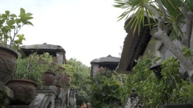 Stone staircase in a beautiful tropical cottage village. Slow motion.