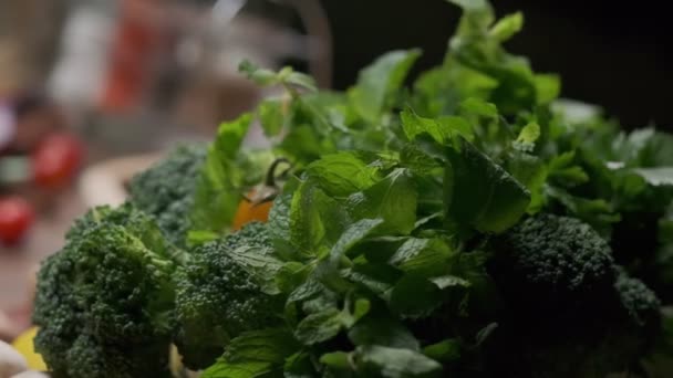 Fresh Greens Veggies Table Close Slow Motion — ストック動画