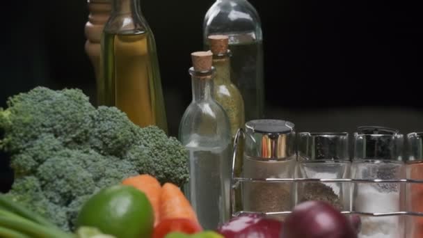 Fresh Vegetables Greens Bottles Olive Oil Vinegar Some Spice Jars — Vídeos de Stock