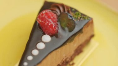 Slow motion close-up shooting of sweet berry and fruit brand desserts