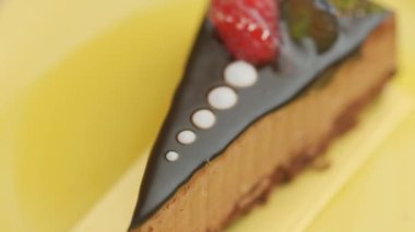 Slow motion close-up shooting of sweet berry and fruit brand desserts