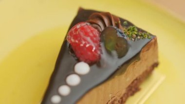 Slow motion close-up shooting of sweet berry and fruit brand desserts