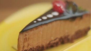 Slow motion close-up shooting of sweet berry and fruit brand desserts