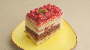 Slow motion close-up shooting of sweet berry and fruit brand desserts