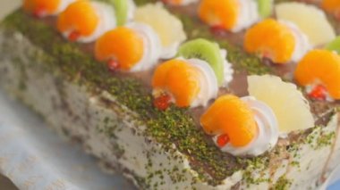 Slow motion close-up shooting of sweet berry and fruit brand desserts