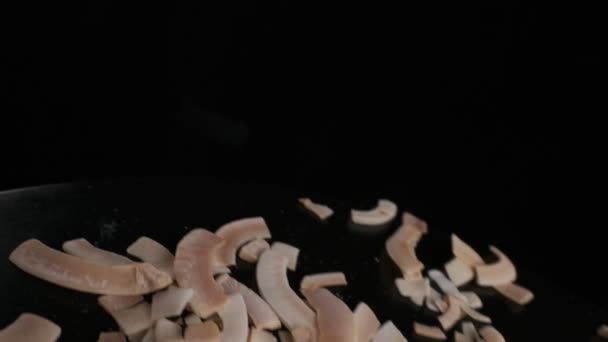 Coconut Chips Falling Table Close Black Background Slow Motion — Vídeos de Stock