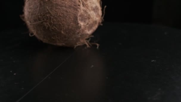 Coconut Spinning Black Background Slow Motion — Vídeo de stock