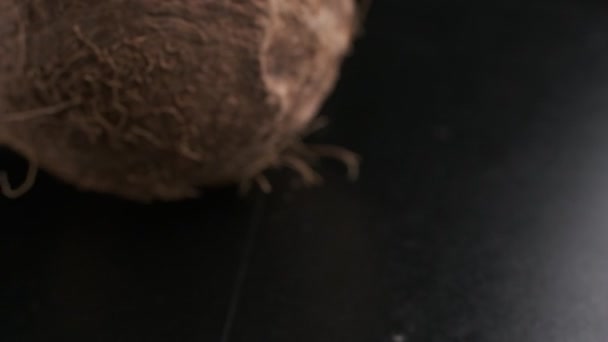 Coconut Spinning Black Background Slow Motion — Vídeo de stock