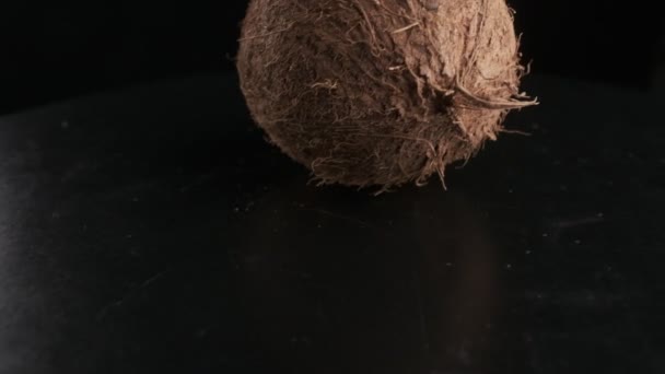 Coconut Spinning Black Background Slow Motion — Stockvideo