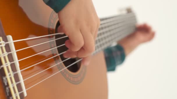 Little Boy Playing Big Classical Guitar Sitting Stool Slow Motion — Stock videók