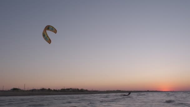 Kiteboarding Sunset Man Kiteboard Rides Evening Mans Silhoulette Setting Sun — Stock Video