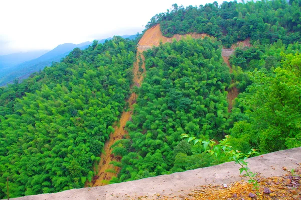 Road come across the mountainside — Stock Photo, Image