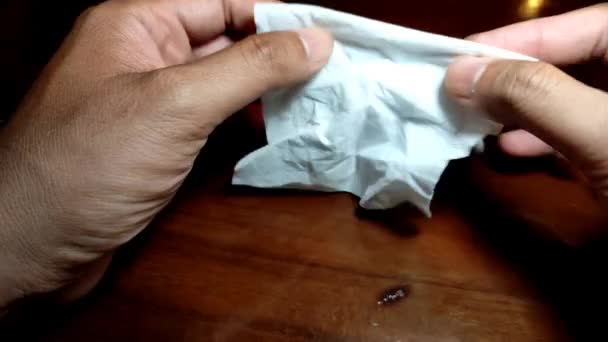 Man Folds Paper Towel Small Size — Vídeo de Stock