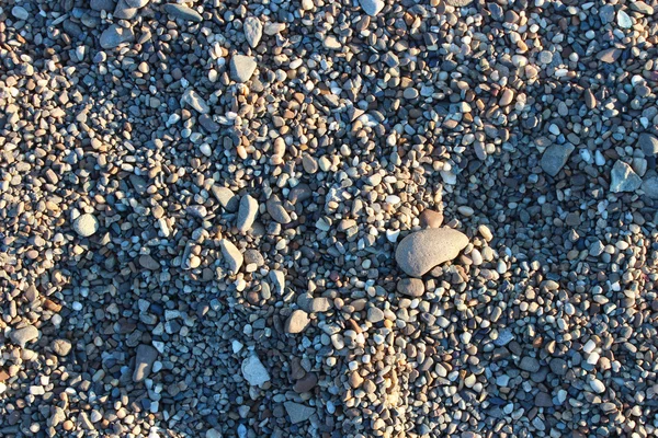 güneşli çakıl doku