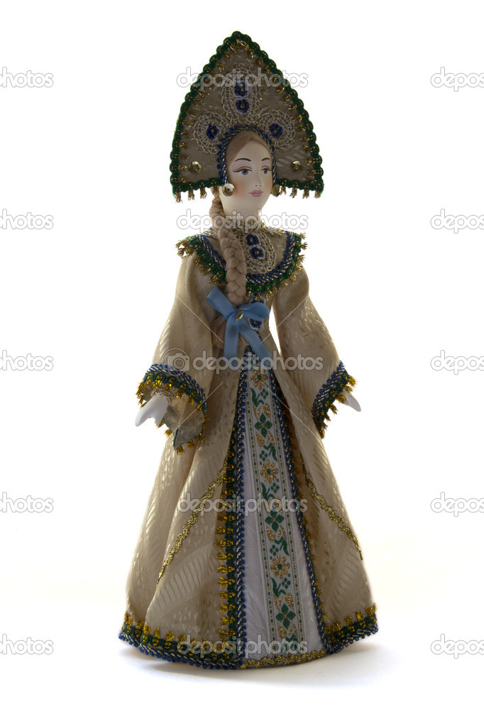 Russian doll in national costume on a white background