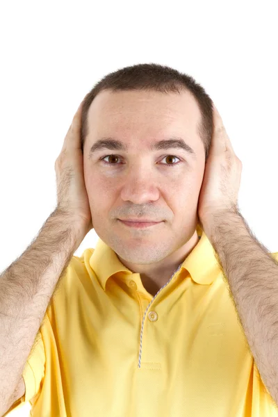 Man covers his ears with his hands — Stock Photo, Image