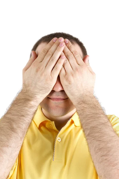 Man puts his hand over his eyes Stock Picture