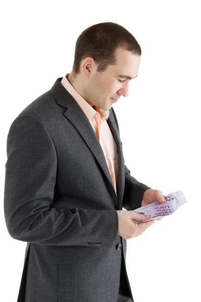 Stack banknotes of 500 euro in hands of man — Stock Photo, Image