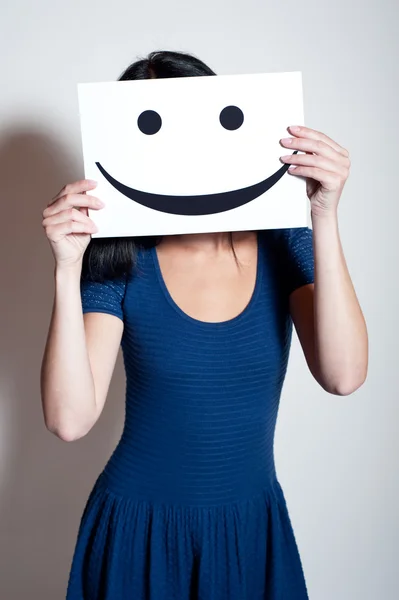 Young Woman holds a smile — Stock Photo, Image