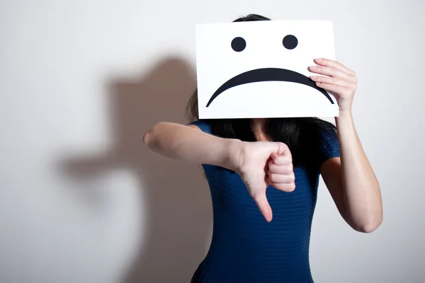 Holding a blank paper with sad face — Stock Photo, Image