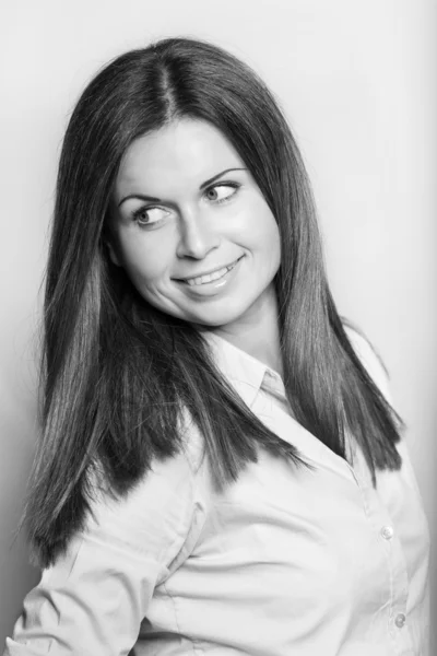 Beautiful young woman smiling on white background — Stock Photo, Image