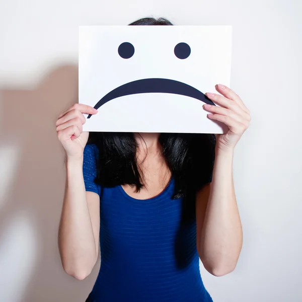 Holding a blank paper with sad face — Stock Photo, Image