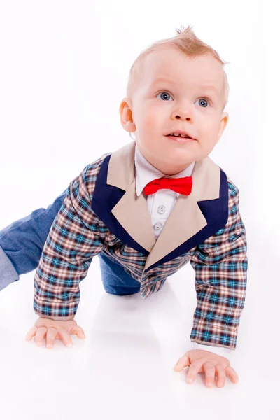 Bebê vestindo terno no fundo branco — Fotografia de Stock