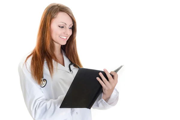 Uczeń kobiece kobieta lekarz pisania w terminarz — Zdjęcie stockowe