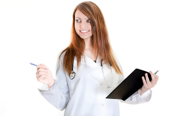 Estudante médica escrevendo em um planejador — Fotografia de Stock