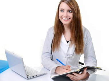 Öğrenci kadın doktor bir planlayıcısı olarak yazma