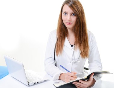 Öğrenci kadın doktor bir planlayıcısı olarak yazma