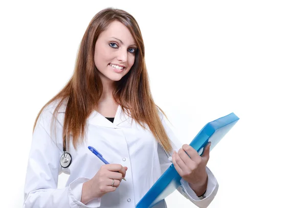 Uczeń bardzo kobiece kobieta lekarz pisanie notatek — Zdjęcie stockowe