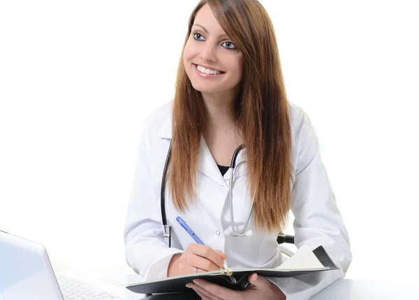 Student female doctor writing in a Planner — Stock Photo, Image