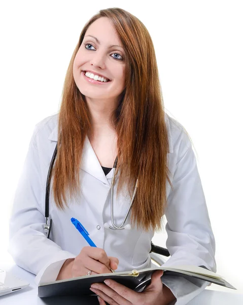 Student female doctor writing in a Planner — Stock Photo, Image