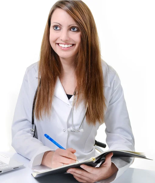 Student female doctor writing in a Planner — Stock Photo, Image