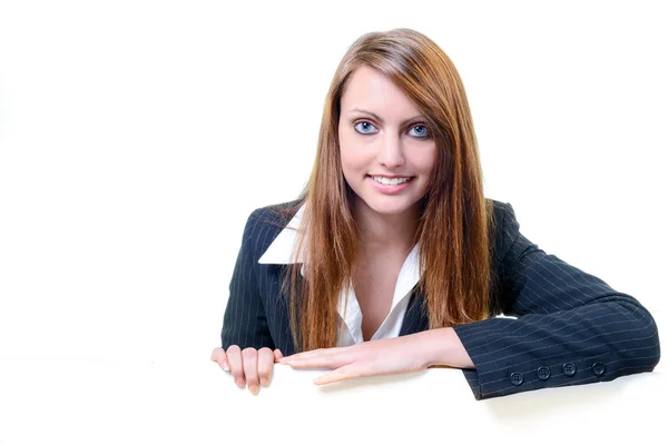 Young businesswoman holding blank message board — Stock Photo, Image