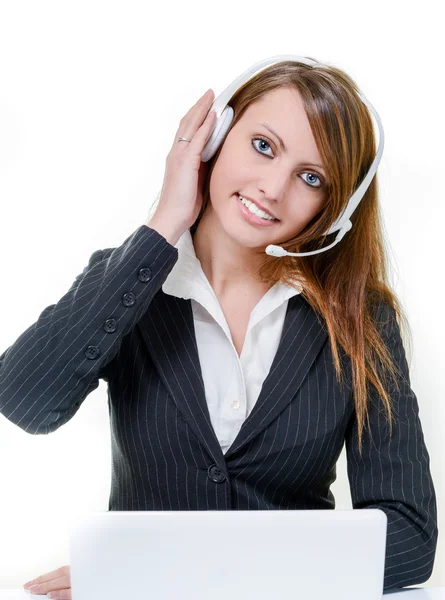 Smiling attractive call center agent Stock Photo