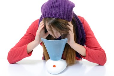 A young woman with colds and flu inhaled essential oils clipart