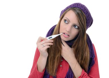 Pretty young girl using a thermometer in her mouth clipart